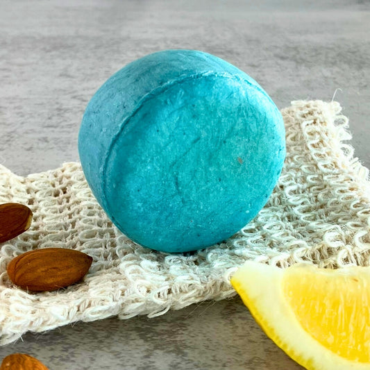 Natural citrus shampoo bar with sweet almond oil and Cambrian blue clay from Edenwild Beauty.