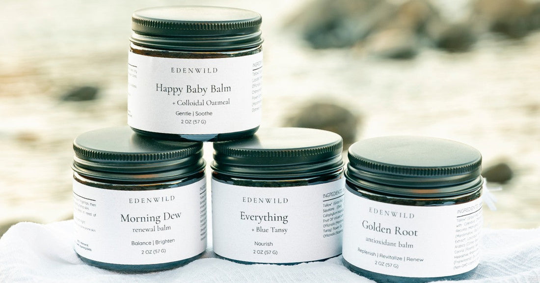 Stack of Edenwild tallow balms in natural light showcasing gentle, family-safe skincare formulated with minimal ingredients to calm, protect, and restore sensitive skin
