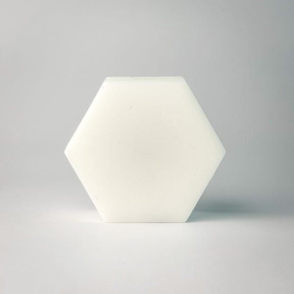 Edenwild Aire conditioner bar in hexagonal shape on white surface — sulfate-free solid conditioner bar for soft, moisturized, and frizz-free hair