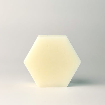 Edenwild Aire conditioner bar in hexagonal shape on white surface — sulfate-free solid conditioner bar for soft, moisturized, and frizz-free hair