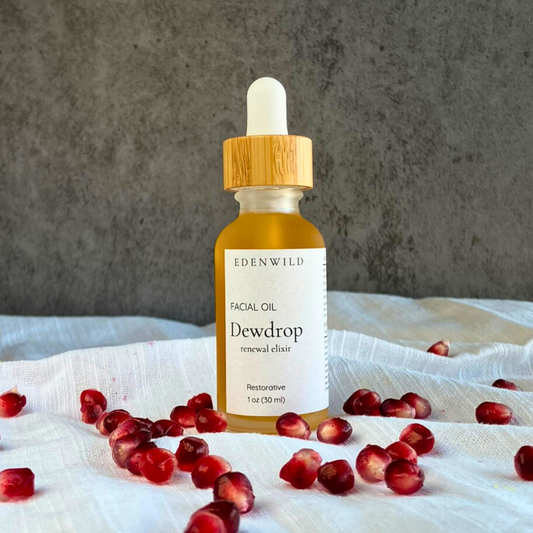 Anti-aging facial serum in glass bottle, nourishing natural ingredients by Edenwild Beauty.