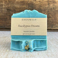 Edenwild Eucalyptus Dreams natural soap bar with cream label on rustic wood surface — botanical bar soap to nourish and soothe dry, sensitive skin