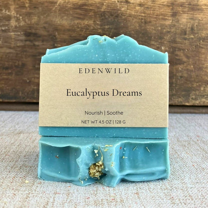 Edenwild Eucalyptus Dreams natural soap bar with cream label on rustic wood surface — botanical bar soap to nourish and soothe dry, sensitive skin