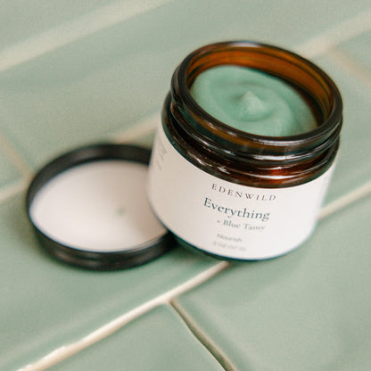 Edenwild Everything Balm on stone surface — blue tansy and grass-fed tallow balm for eczema relief and sensitive skin barrier support