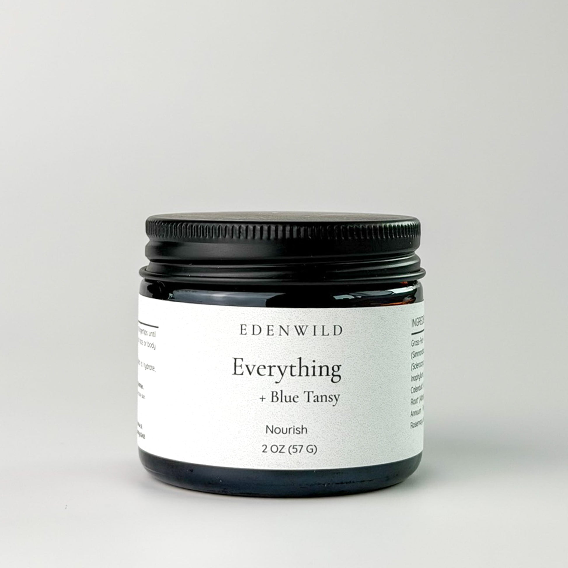 Edenwild Everything Blue Tansy tallow balm in amber glass jar — grass-fed tallow balm for eczema, sensitive skin, and skin barrier repair