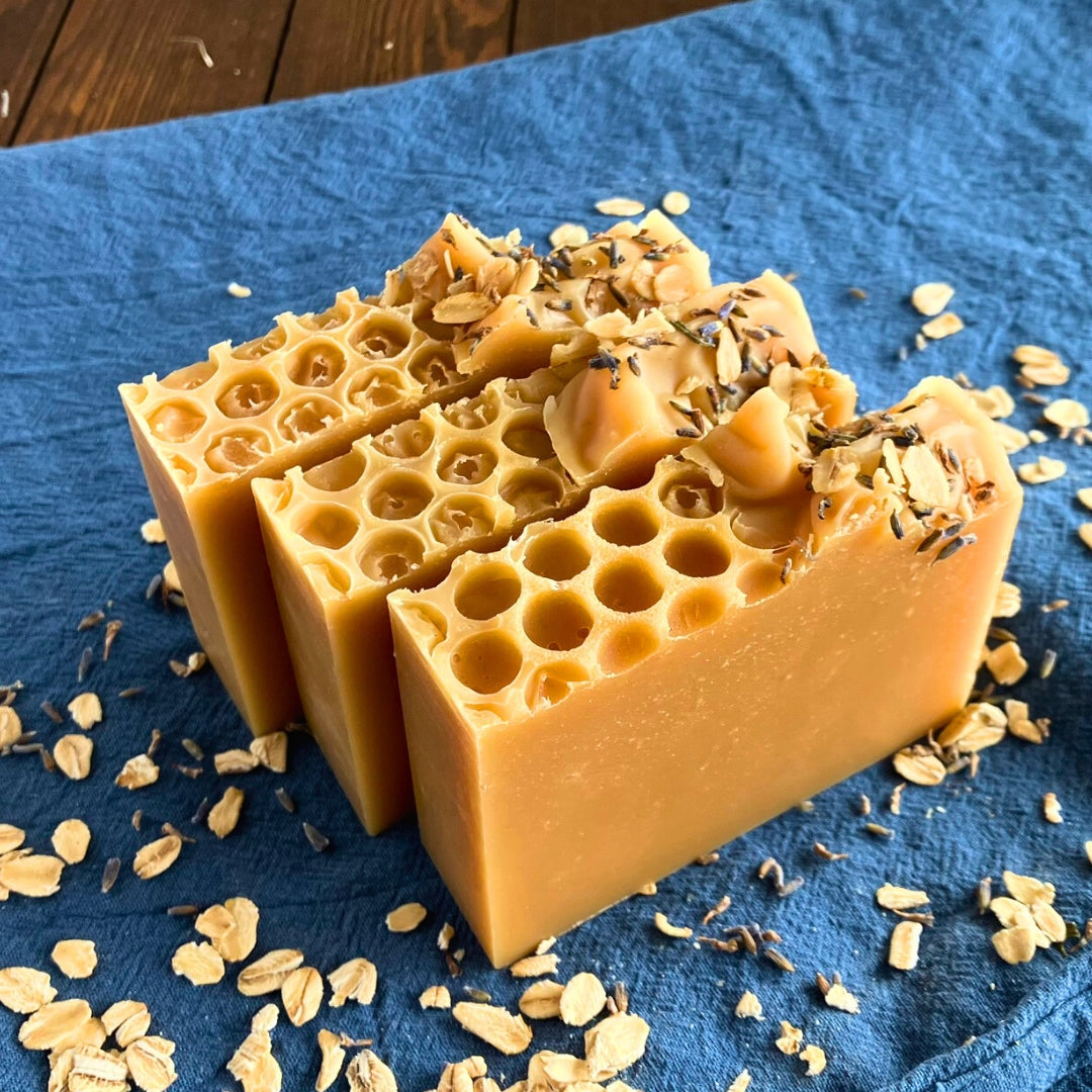 Bestselling Honey Lemon goat milk soap bar nourishes and soothes sensitive skin by Edenwild Beauty.