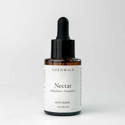 Edenwild Nectar anti-aging face serum in amber dropper bottle — bakuchiol and vitamin C serum for fine lines, skin renewal, and radiant complexion