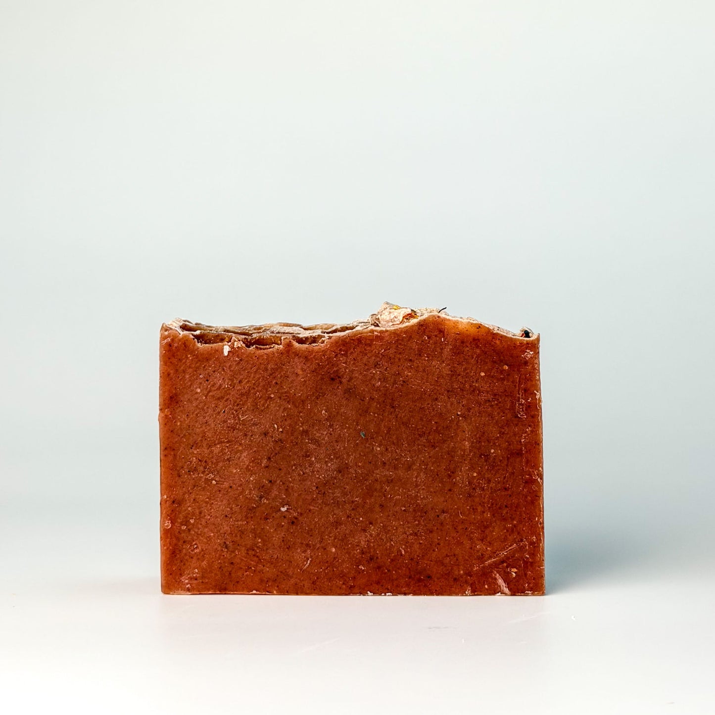 Side view of Edenwild Wildflower Garden gentle cleansing soap bar showing natural color and texture